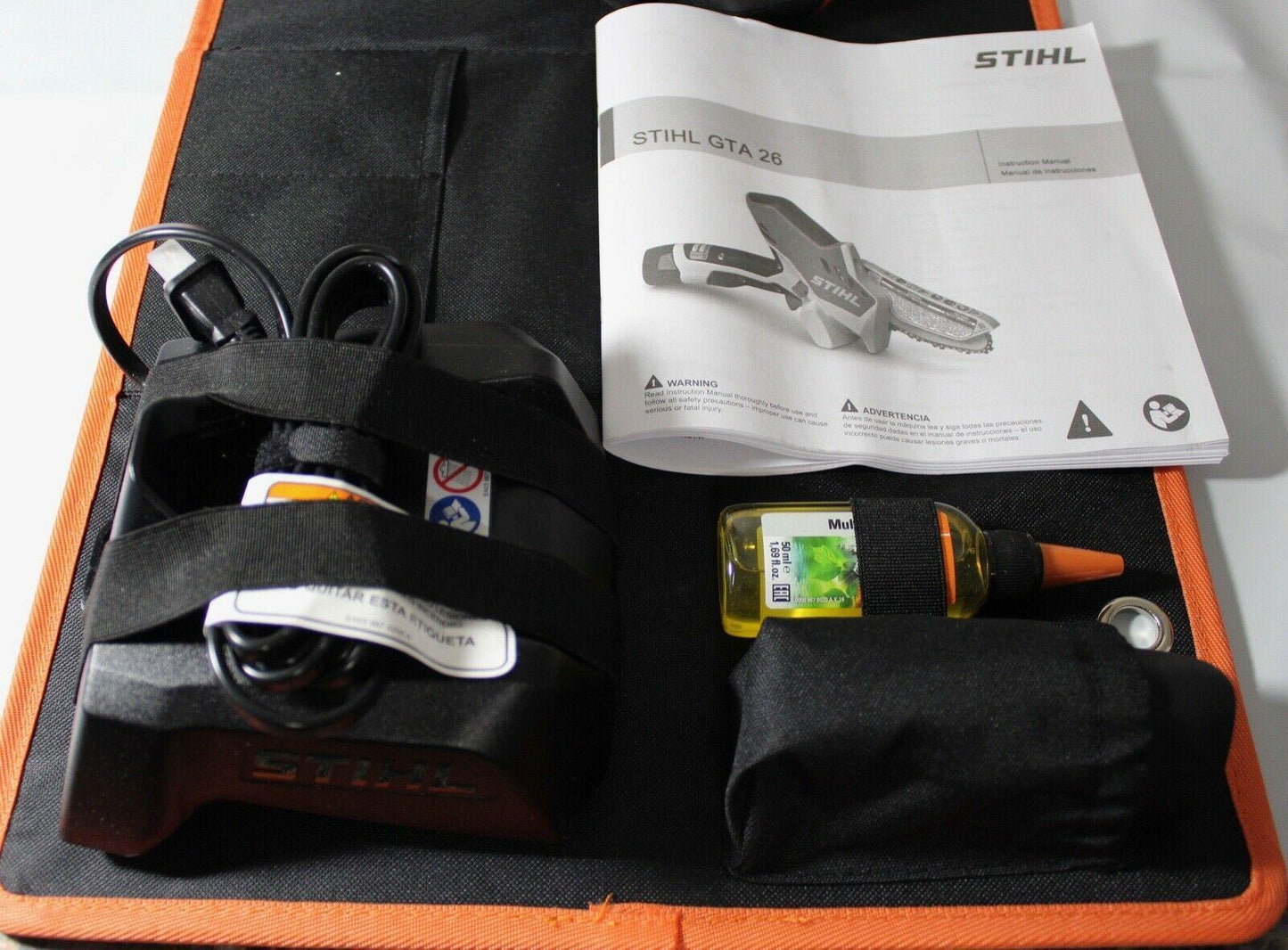 STIHL GTA 26 PRUNER CHAINSAW W/CARRYING CASE, BATTERY AND CHARGER.